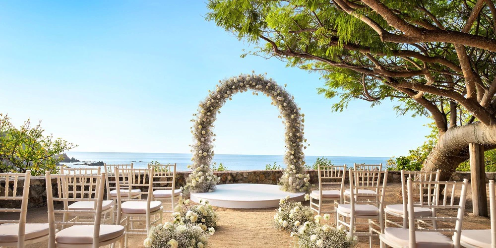 Oceanfront gazebo ceremony setup for weddings at Secrets Huatulco