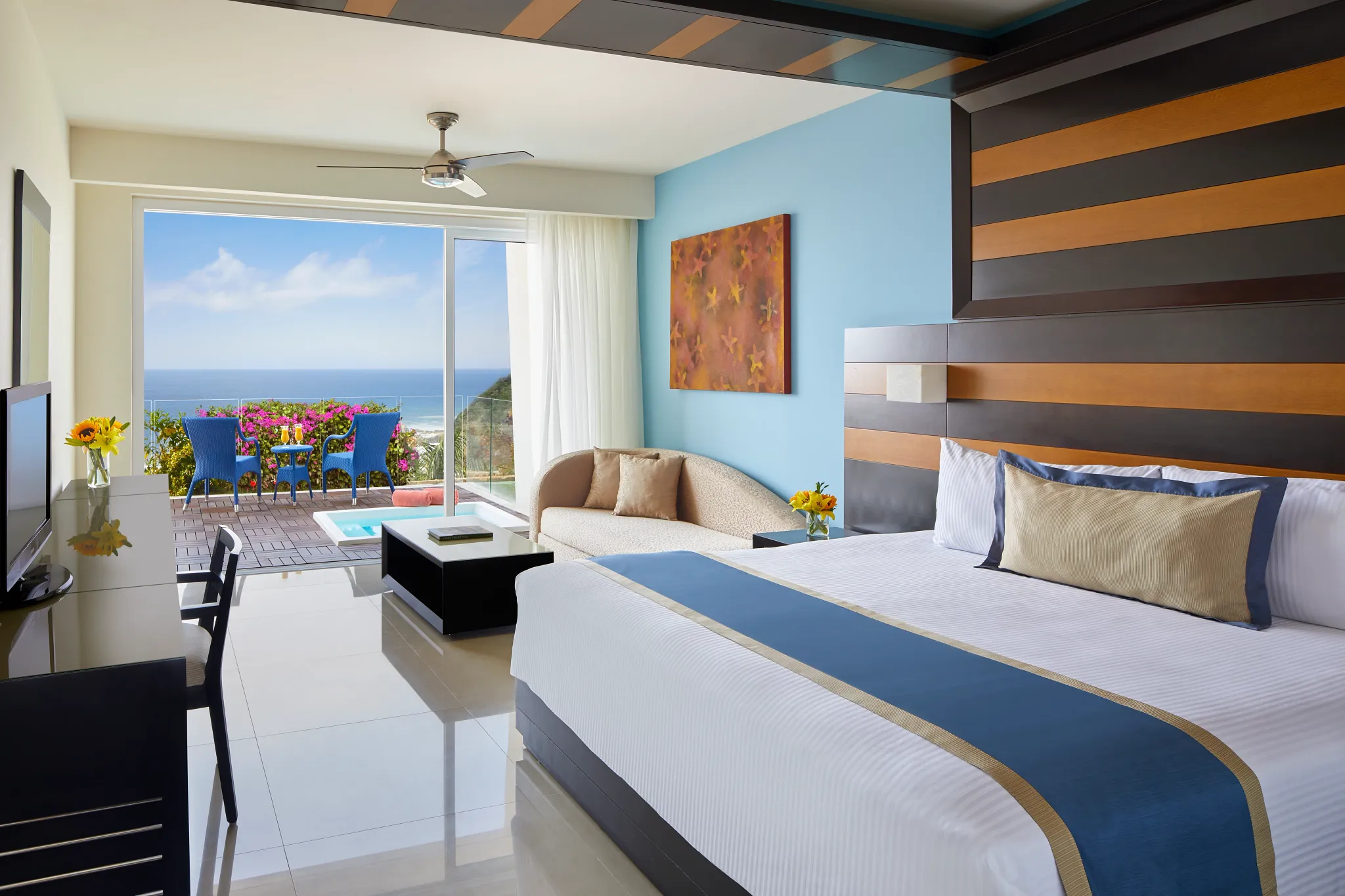 Junior Suite with Hot Tub featuring king bed and ocean view at Secrets Huatulco Resort & Spa.