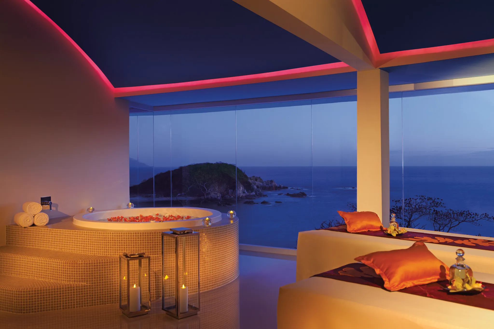 Romantic couples spa cabin with ocean views at Secrets Huatulco Resort & Spa, designed for private adults-only relaxation.
